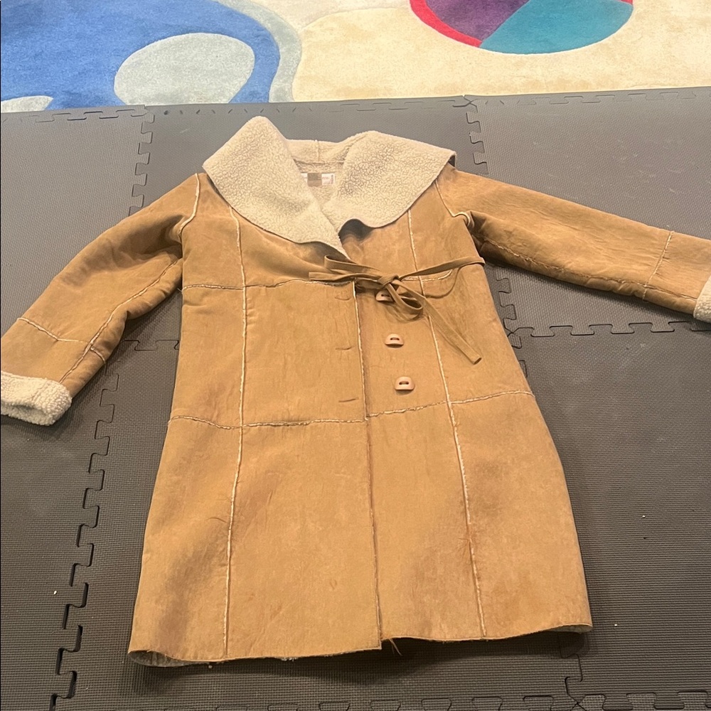 Tan faux Shearling Coat with Tie Waist and buttons.